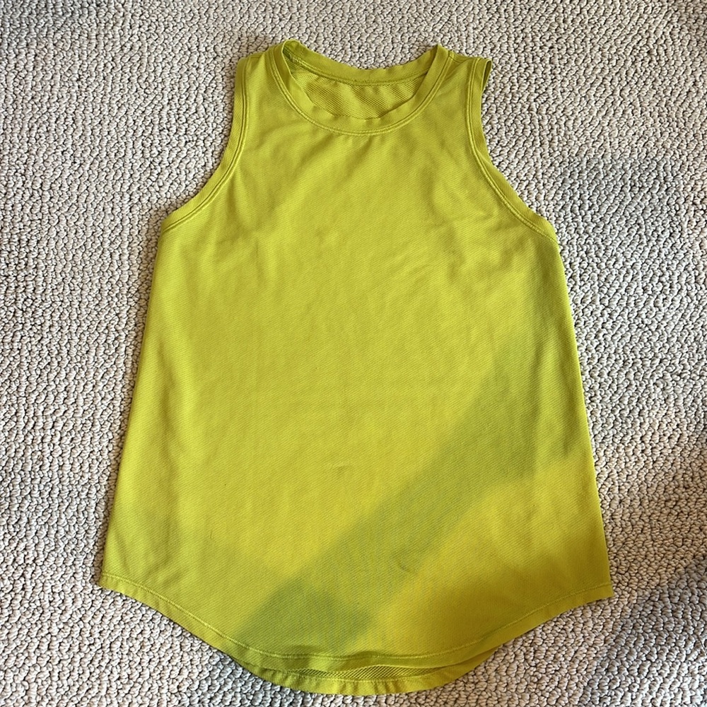 Lululemon yellow tank top size 0 good condition but has 2 marks